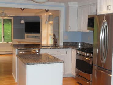 Kitchen Remodel Our client was looking for a kitchen remodel involving new countertops, appliiances, cabinet faces and painting.