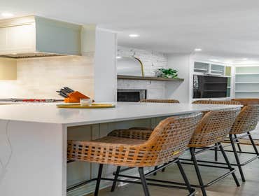 Photos by Albrecht, LLC #1 Through strategic space planning, thoughtful material selections, and custom craftsmanship, this first-floor renovation tran