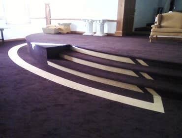 Just me and the wife Remodeled a Church in Petersburg. I built a half round stage with rounded steps. I then added arcs to the headers over choir area.