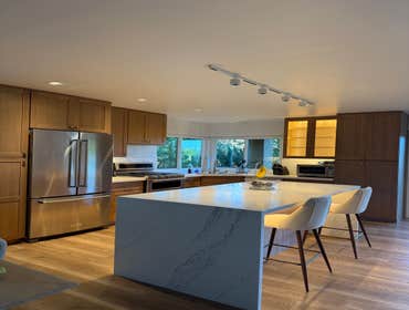 Photos by Dreamhome Buliders and Renvoations Inc #1 We completely transformed the old kitchen by installing custom white oak kitchen cabinets, a new co