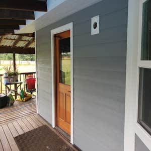 Siding Department Country House Full reside of Exterior of Home and Spa House including trim and soffit James Hardie 7" reveal Color+, James...