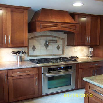 Upland Kitchen Remodel This kitchen was expanded in size by approximately 150 sf. The cabinets used are KraftMaid using Maple in the Sedona door style 