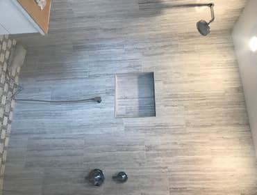 New master bath with diverted shower heads