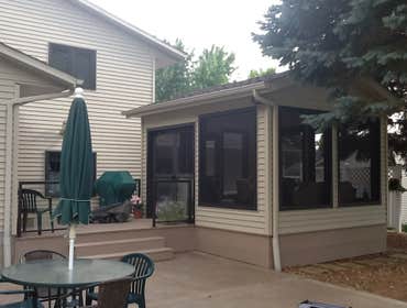 Photos by Custom Home Specialties Inc #2 Timber Tech maintenance free decks with powder coated railings.