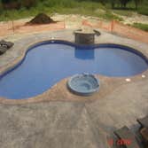 Custom in-ground pool with spa This is a beautiful pool spa combination located in a new luxury sub-division is Gretna Nebraska. This pool was built fo