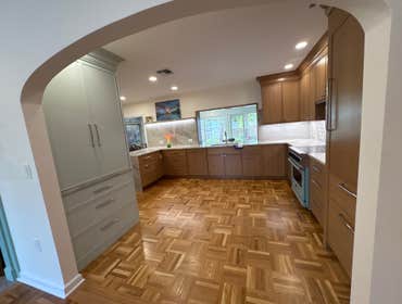 Whole House /ADU Remodel- Custom-designed kitchen featuring granite countertops and updated appliance.
Custom-built cabinets and bookshelves designed f