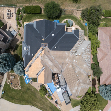 Indian Peaks - Tile Roof Replacement Roof and 10 large window were damaged by a large hail storm. PRQ Exteriors worked the homeowner's insurance to get