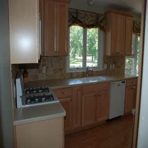 Kitchen Remodel New Cabinets, counter tops, back splash and floor