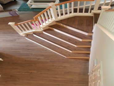 Photos by A&A Flooring Specialist, Inc. Dba One Source Construction #5 Stairs and Lower flooring with LVP