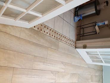 Ceramic tile floor installatio