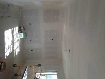 Photos by Barron Roofing, LLC #2 Remodeling of a livingroom in Artesia, NM
Home built in 1950's
Gutted entire living room
Installed new Sheetrock
Tape 