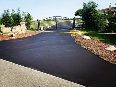 Photos by Metro Sealcoating/striping LLC #3 Restripe existing parking stalls, Pressure wash & Sanitized all hand rail and sidewalks and 3 staircases th