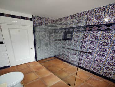 Bathroom Renovation Bathroom renovation project with beautiful Mexican artistic tile with lizards and a curb-less shower.