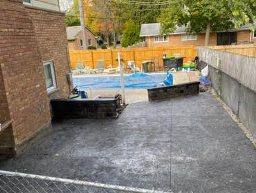 Photos by Guevara Alexander #1 A curated collection of our high-end residential concrete work, including stamped patios, exposed aggregate driveways, w