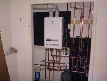 Photo(s) from Gama Climate Llc Navien Electric water heater installation