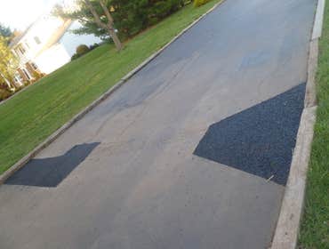 Project photos from Back To Black Sealcoating LLC The First picture is a driveway that was done 3 days prior to taking the picture.. The second picture