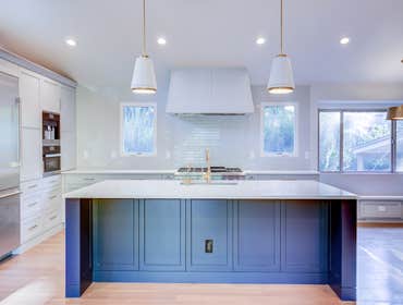 Whole home remodel This was an interior remodel of our client's split-level home. We removed the dividing walls on the main floor to create an open kit
