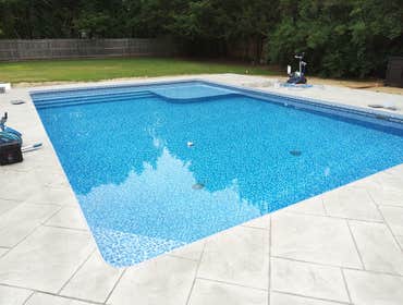 Photos by Mcm Pool Design, Inc #1 Inground Vinyl Swimming Pool Installation and Stamped Concrete Deck Installed Fall 2019