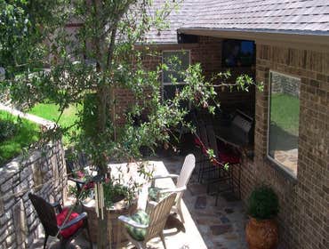 Cedar Garage Door and Backyard Kitchen