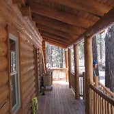 Custom Log Cabin Completed all construction tasks on custom log cabin besides log raising, including floor, roof, and interior wall framing. Separate t