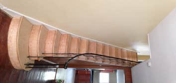 Wood Refinishing This specific job was for 3 rooms and a flight of stairs. We removed the rugs, sanded the floors, stained & sealed the floors, and tou