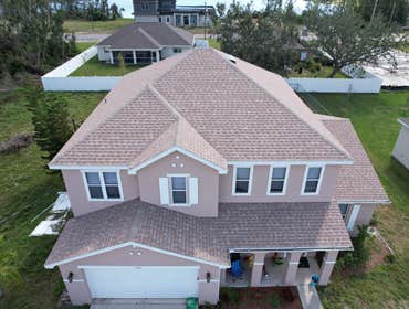 Photos by WOODSTONE ROOFING