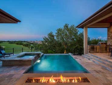 Geometric 1 Geometric Pool with Color LED bulbs and Aqua Blue Pebble