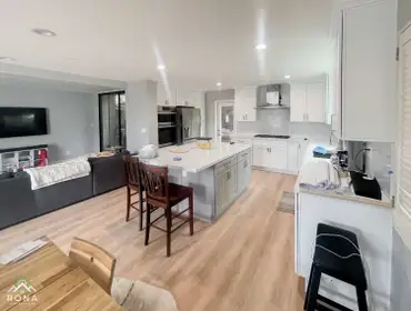 Culver City Kitchen Remodel We turned this Culver City kitchen into your modern, functional haven! Imagine crisp white cabinets with a light gray islan