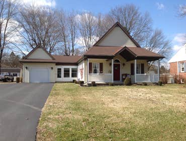 Project photos from Griesemer Construction The exterior of this porch was old deteriorated concrete with a aluminum posts & roof.Now it's trex lumber d