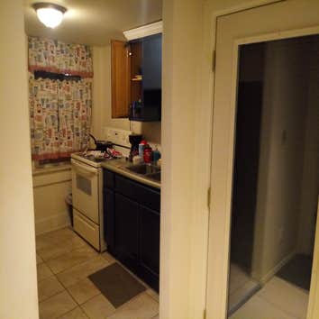 Entire apartment kitchen build out with custom blue cabinets!