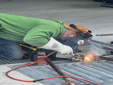 Glint Carwash Welding in accordance with AWS D1.1