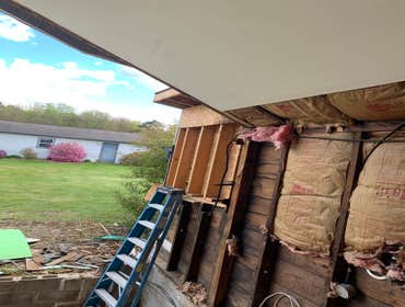 Photos by C.S Remodeling & Construction #1 Dust protection and entry to home protection temporary wall built to prevent anyone or anything from getting