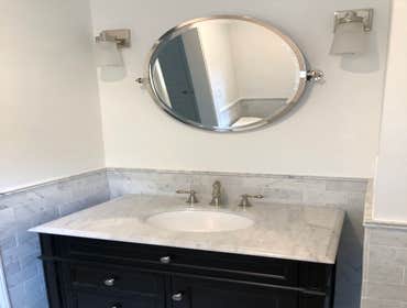 Photos by KE Home Remodel llc #1 Complete bathroom renovation