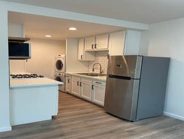 Small kitchen remodel@2021 Replace all the cabinets, install new microwave, washe/ dryer and vent for them. We cut quortz counter top on site.