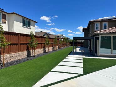 Photos by Cornerstone Hardscape #3 Backyard Hardscape & Artificial Turf Installation
Complete backyard transformation featuring a clean, modern, low-m