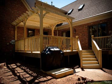 Peach Deck This project was a complete reconfiguring of the original deck and adding a pergola.
