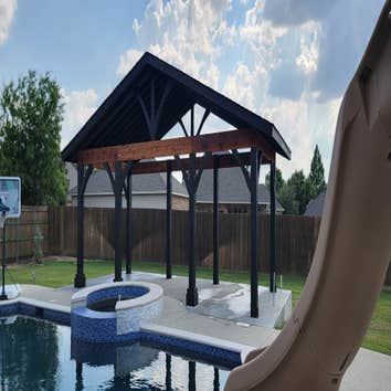 Big Timber Cedar Gable Cedar Gable structure utilizing Big Timber Wood. Two-tone paint job, custom fabricated post plates