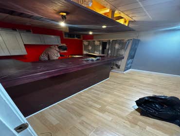 Photos by Monumental Construction #16 We transformed this bar on the basement, into a new office. Adding a door and covering all the floors and ceiling