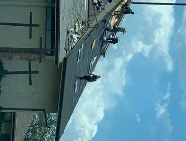 Roofing a church in Littleton