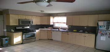 New Kitchen and New Wood Floor Remove and gutter out full kitchen, Install new housing lights, new under cabinet light, new cabinets, new crown molding