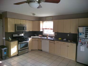 New Kitchen and New Wood Floor Remove and gutter out full kitchen, Install new housing lights, new under cabinet light, new cabinets, new crown molding