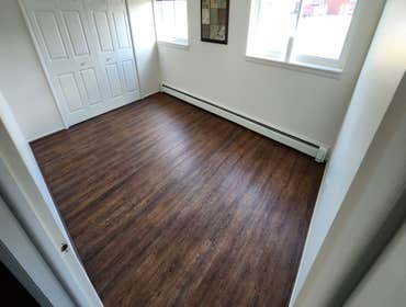 Photos by Trinity Custom Home Builders LLC #1 Remove old carpet, level floors and install new LVP flooring.