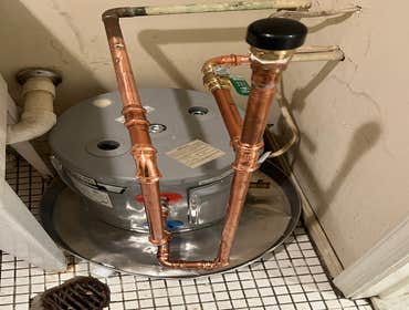 Photos by Bp Contractors LLC #6 So cute! Little 5 gallon water heater ready to heat up!