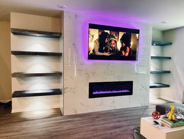 CUSTOM FIREPLACE WALL AND SHELVING
