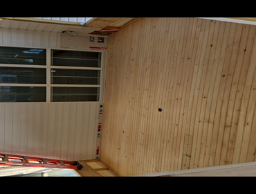Installation of shiplap and screened in porch
