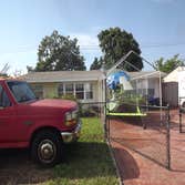 REEVES ROOFS REMOVAL OF OLD SHINGLES AND FLAT DECK TOP & BASE SHEET AND INSTALL NEW .