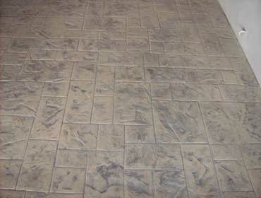 Stamped, colored concrete.