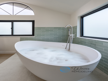 Soaking The Stress Away From a relaxing soak in a freestanding tub to a refreshing rinse in a sleek glass shower, this remodel showcases how elegance a