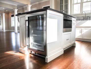 Baine Contracting Inc Project Multiple jobsites - showing kitchens, interior and exterior trim work, new homes, bathrooms, tile work, wood and iron ra