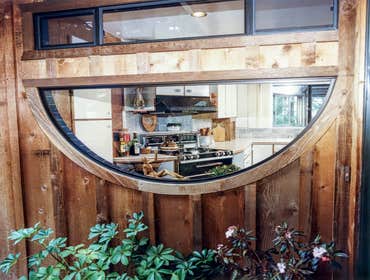 1983: Semi-Circle Sensible Kitchen This unique and small, old Del Mar home required a unique solution to its tiny kitchen. We enlarged the kitchen by r